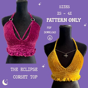 May include: Two crochet corset tops on mannequins, one magenta and one mustard yellow, featuring ruffled hems and halter necklines. Text reads: SIZES XS - 4X, PATTERN ONLY, PDF DOWNLOAD, THE ECLIPSE CORSET TOP. The magenta top has silver ring details.