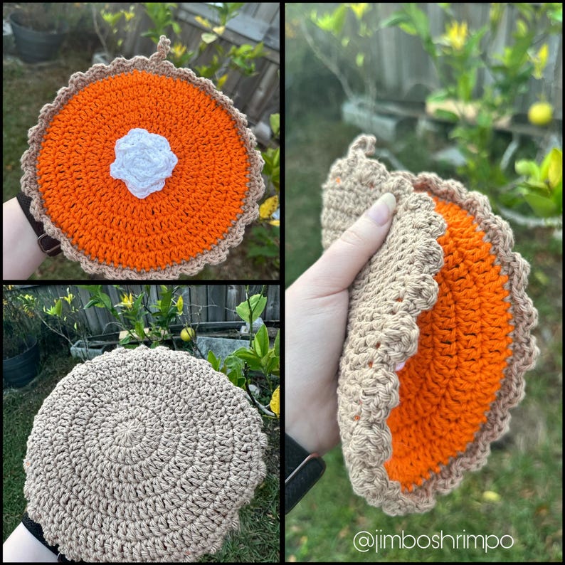 May include: Crocheted pie-shaped hot pads in orange, tan, and white. The pads have a scalloped edge and a loop for hanging. One pad has a white crocheted dollop in the center. The image includes a close-up of the pad and a view of the back.