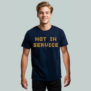 May include: A navy blue t-shirt with the text "NOT IN SERVICE" in yellow block letters.