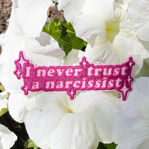 Toppa glitterata narcisista