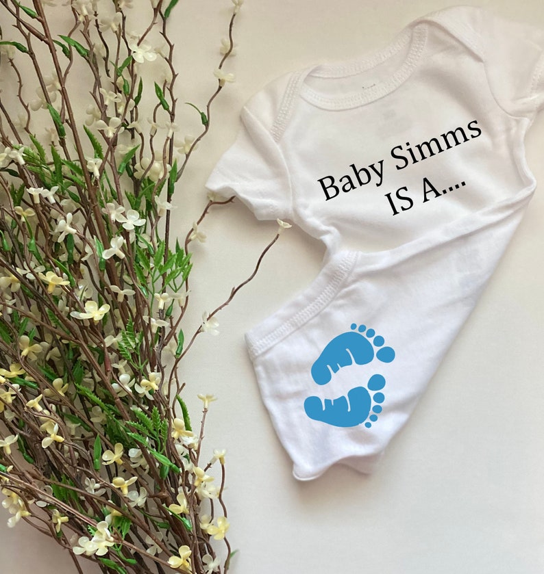 Baby Boy gender reveal onesie Etsy