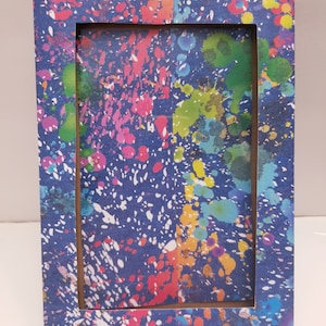 Marco de fotos con salpicaduras de paintball