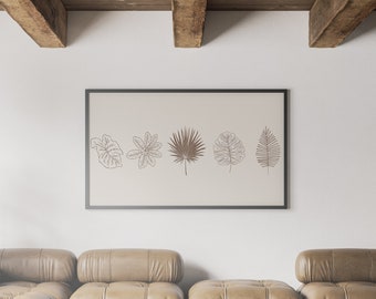 May include: A living room interior with a brown leather sectional sofa, a black coffee table with a marble top, a potted plant, and a framed print of five line drawings of leaves on a white wall.