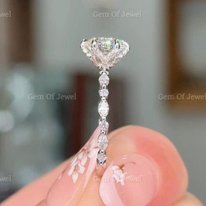 Ronde moissaniet-diamanten verlovingsring met zwevende bubbeldiamant band van marquise en ronde diamanten met zes effen lotusbloembloemblaadjes