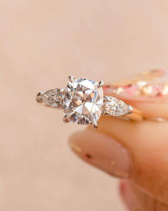 Cushion pear 2024 engagement ring