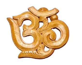 OM wood hand carved . Wall decoration, Buddhism, yoga, meditation. Nepal