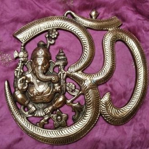 OM Ganesha for wall in bronze. Decoration, altar yoga, Buddhism, meditation. Bronze decoration. India.