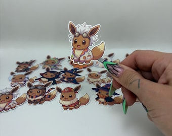 Klistermärken med Eevee i kostymer