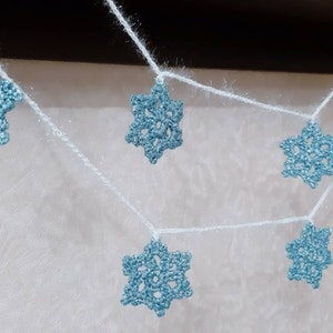 Snowflake garland. Christmas mantel garland, Snowflakes banner. Ice blue garland winter holiday decor