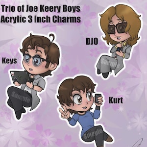 May include: Three cartoon character charms, each 7.6 cm in diameter, featuring a different character from the show "Stranger Things". The characters are Keys, DJO, and Kurt. The charms are made of acrylic and have a glossy finish.