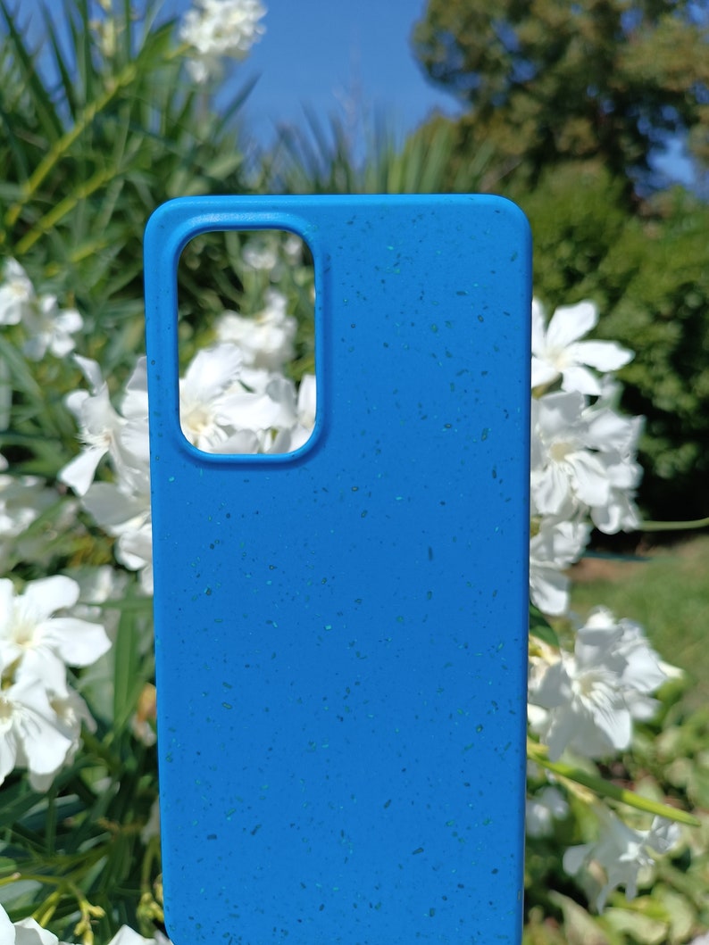 A blue case set amidst nature