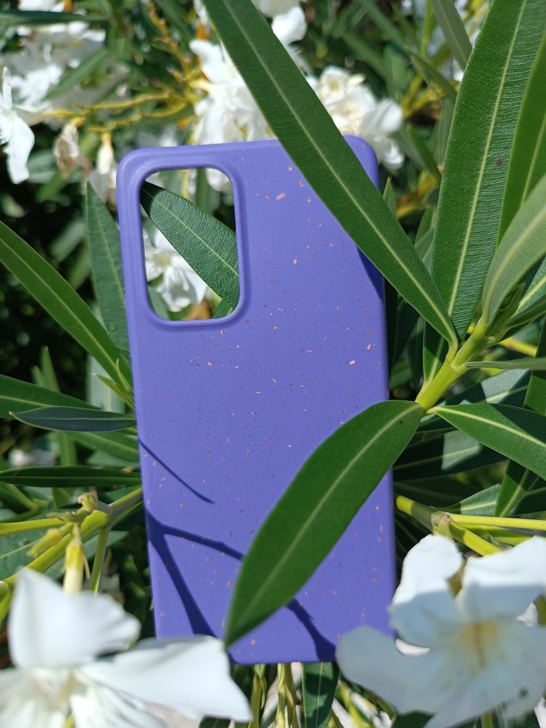 A purple case set amidst nature