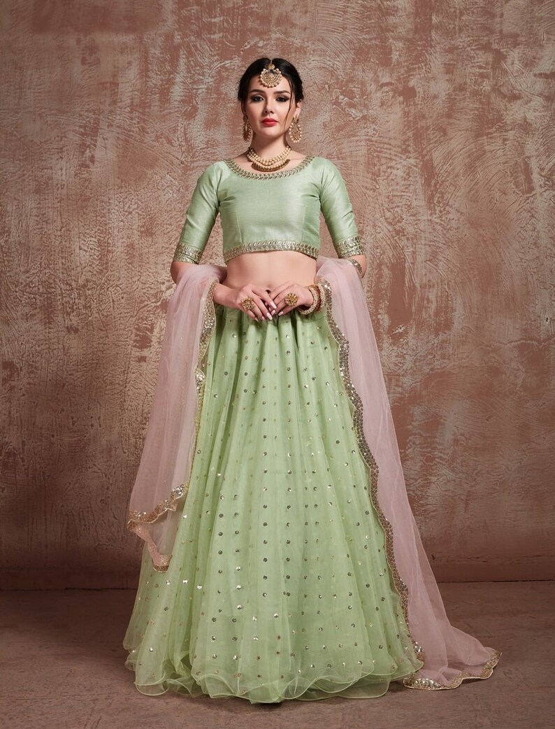pastel green net lehenga