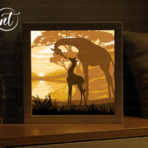 Modello di scatola luminosa giraffa madre e bambino, modello di scatola ombra ritagliata in carta