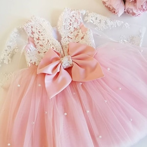 Cute baby girl in sales pink dress