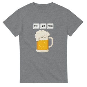 May include: Grey t-shirt featuring a beer mug graphic and the text "CTRL ALT DRINK". The beer mug is yellow with white foam. The text is in a keyboard key style.