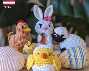 May include: A set of crocheted Easter animal toys, including a bunny, chick, lamb, and hen. The toys are sitting on a wooden surface with crocheted eggs.