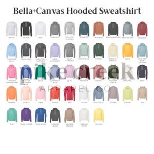 May include: A variety of Bella+Canvas hooded sweatshirts in various colors, including white, black, and heather grey. The image displays a wide range of hues, from Carolina blue to vintage black, with the brand name at the top.
