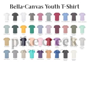 May include: A colour chart of Bella+Canvas youth t-shirts. The shirts are displayed in a grid, showcasing a variety of colours including white, black, navy, pink, and teal. The text "Bella+Canvas Youth T-Shirt" is at the top.
