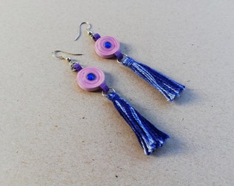 Handmade quilling circle paper earrings. Purple and pink earrings with a handmade tassel in shades of blue. Nickel free earring hook