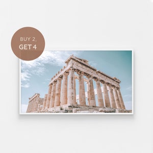 May include: A photograph of the Parthenon in Athens, Greece. The ancient Greek temple is made of white marble and has many columns. The sky is blue and there are clouds in the background.