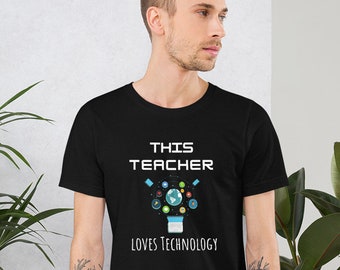 May include: Black t-shirt with white text that reads "This Teacher Loves Technology". The text is surrounded by a graphic of a light bulb with a globe inside and various colorful icons around it.