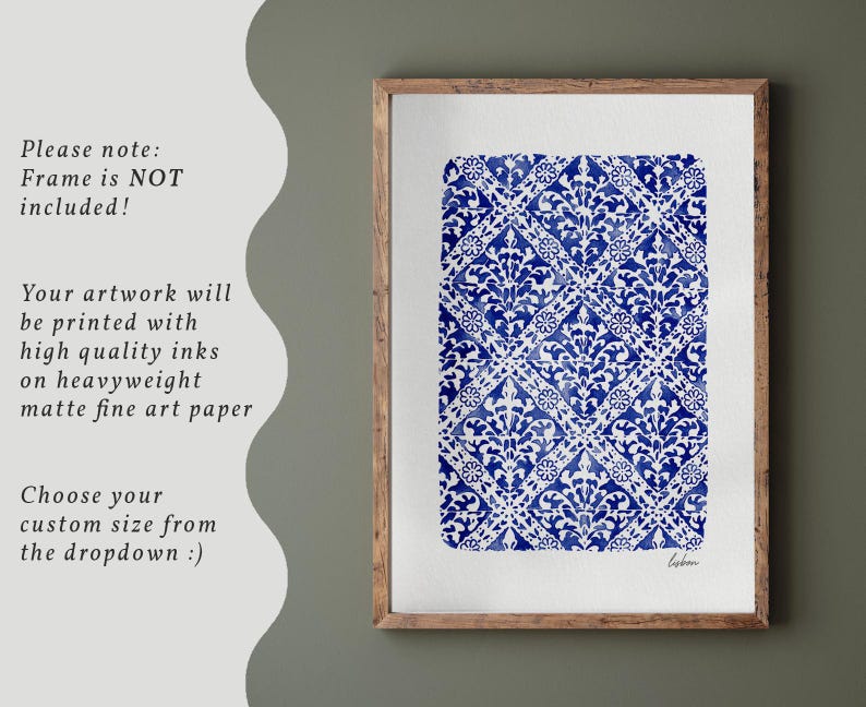 May include: A rectangular art print featuring a blue and white repeating damask pattern on a white background, enclosed in a wooden frame. The print displays a detailed floral motif arranged in a diamond grid, with the word Lisbon written in script.