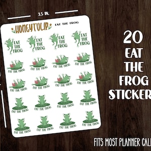 May include: A sheet of 20 green frog stickers with the text "Eat the Frog" on each sticker. The stickers are 3.5 inches wide and 4.3 inches tall. The stickers are designed to fit most planner calendars.