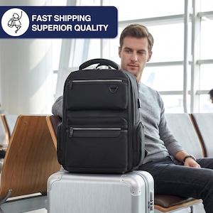 May include: Black backpack with multiple zippered compartments and a top handle. The backpack is sitting on top of a silver suitcase. The image also includes the text "FAST SHIPPING SUPERIOR QUALITY".