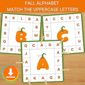 May include: Three square educational activity cards with green borders featuring the text FALL ALPHABET MATCH THE UPPERCASE LETTERS. Each card displays a large orange pumpkin shaped like a letter and a grid of uppercase letters in orange.