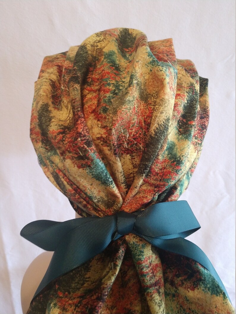 My nursing caps are handmade in my clean home.One size fits all using adjustable elastic with toggle and ribbon ties.Buttons to wear masks.