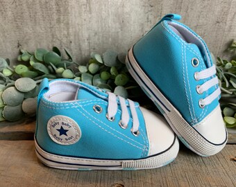 converse turquoise high tops