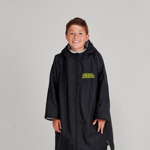 May include: Black hooded poncho with a zipper closure and a yellow graphic that says "Don't Be Reckless".