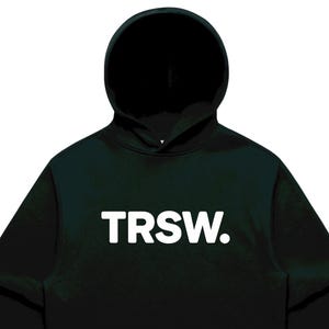 May include: Black hoodie with a front pocket and a hood. The word "TRSW." is printed in white across the chest. The hoodie has long sleeves and a relaxed fit, suitable for casual wear.