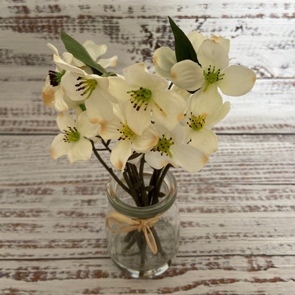 White Artificial Dogwood Blossoms in Glass Jar