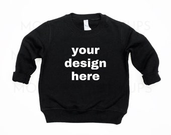 May include: Black long-sleeved sweatshirt with the text "your design here" in white.