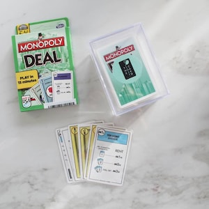 Cartes Monopoly Deal plastifiées (version américaine) - Jeux de cartes, jeux de société, étui de voyage
