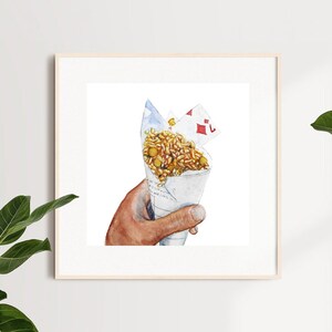 May include: A hand holds a white paper cone filled with a mixture of rice, chickpeas, and other ingredients. The cone is topped with a red and white card.