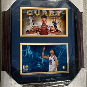 Stephen Curry 2 Picture Framed 13x16 Holding a Basketball and Pointing to Heaven