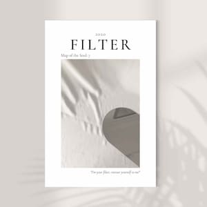 May include: A white poster with the text "2020 FILTER Map of the Soul: 7" and a photo of a white fabric with a heart-shaped opening. The text "I'm your filter, entrust yourself to me" is at the bottom of the poster.