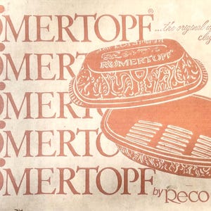 May include: An orange-toned image featuring a clay baker with the text "ROMERTOPF" repeated in the background. The baker is composed of two parts, with decorative patterns. The text "113 Clay Baker" is also visible.