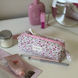 Astuccio trapuntato in cotone "Fiori rosa"
