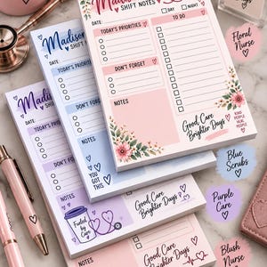 May include: A stack of three personalized nurse shift note pads in pink, blue, and purple, featuring floral accents, stethoscope illustrations, and sections for priorities, to-do lists, and notes, with text including Madison, RN and Good Care Brighter Days.