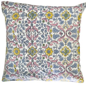 May include: A white pillow cover with a floral pattern in shades of pink, blue, and yellow. The pattern features intricate designs of leaves and flowers.
