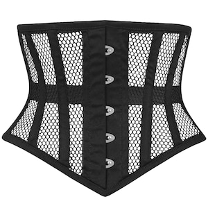 May include: Black corset with a structured design. The corset features a mesh panel design with vertical and horizontal black fabric accents. The front closure has four silver-tone clasps. The corset has a pointed bottom edge.