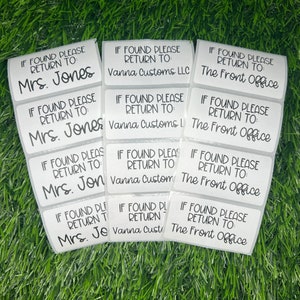 May include: A set of nine white return address labels with black text. The labels read "If found please return to: Mrs. Jones", "If found please return to: Vanna Customs LLC", "If found please return to: The Front Office".