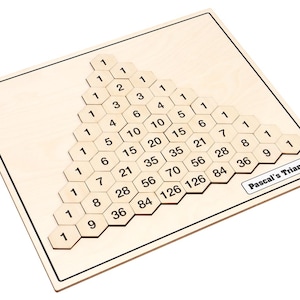 May include: Wooden Pascal's Triangle puzzle with hexagonal tiles displaying numerical values. The numbers are arranged in a triangular pattern on a light-colored wooden board. The words "Pascal's Triangle" are printed on a small white rectangle.