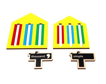 May include: Two yellow wooden houses with red, white, blue, and green stripes inside.  The houses are labeled "thousand" and "simple" on wooden signs.