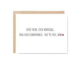 May include: A greeting card with a white background and a brown border. The card features the text "FUCK THEM, FUCK MARRIAGE, AND FUCK COMPROMISE. YOU'RE FREE, BABE" in black font, with a small red heart at the end.