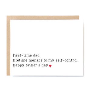 May include: A white greeting card with a brown border. The card has the text "first-time dad. lifetime menace to my self-control. happy father's day" with a small red heart.
